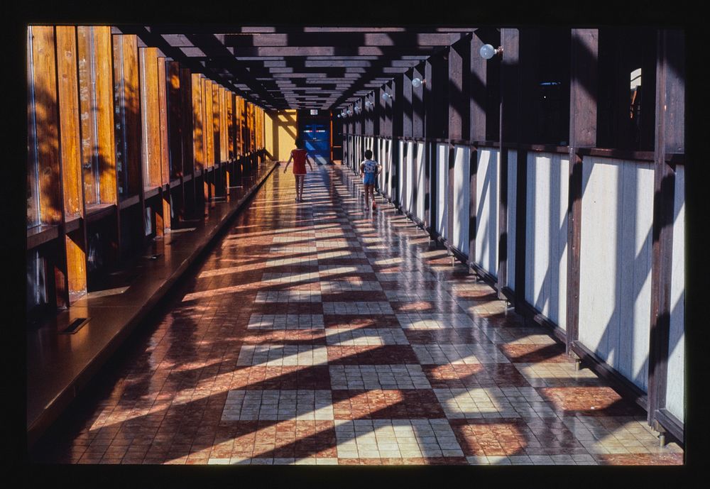 Grossinger's corridor by inside pool, Liberty, New York (1977) photography in high resolution by John Margolies. Original…