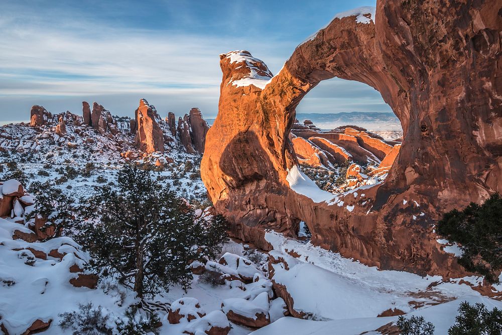 Double O Arch Snowy Sunset