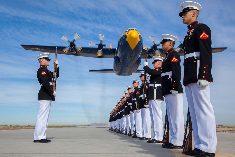 A U.S. Marine Corps C-130T Hercules aircraft with the Blue Angels, the Navy's flight demonstration squadron, flies over…