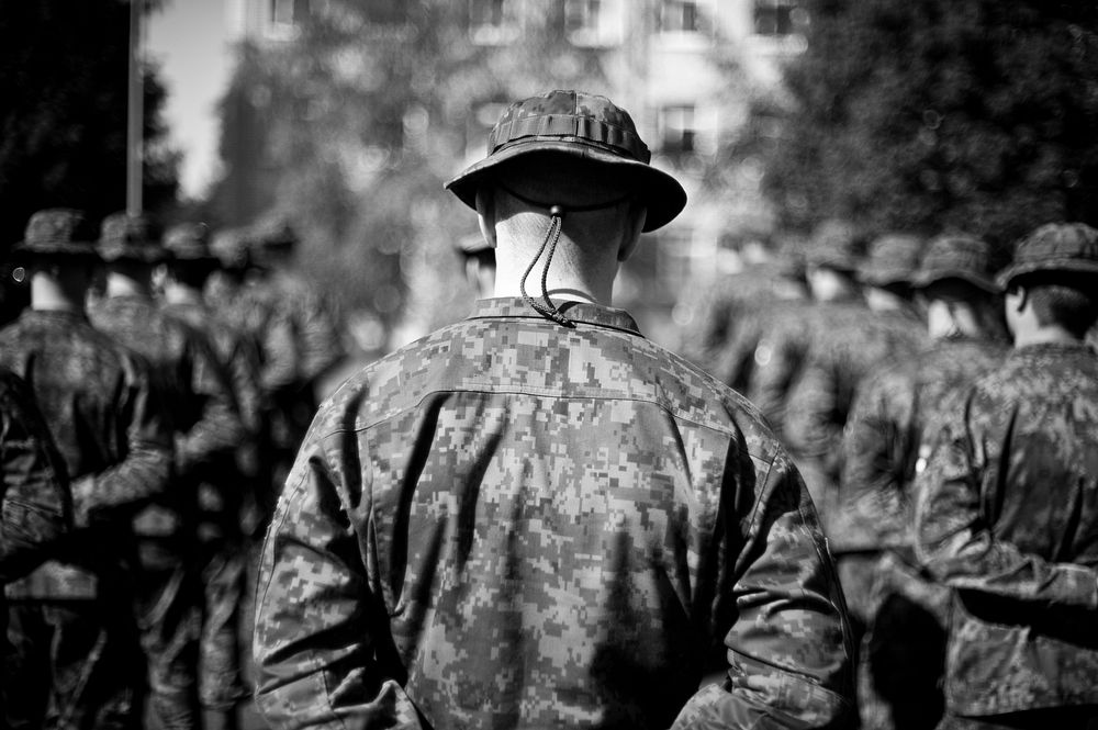 Soldier from the Finnish Army stand in formation during the Saber Strike 2014 opening ceremony. Original public domain image…
