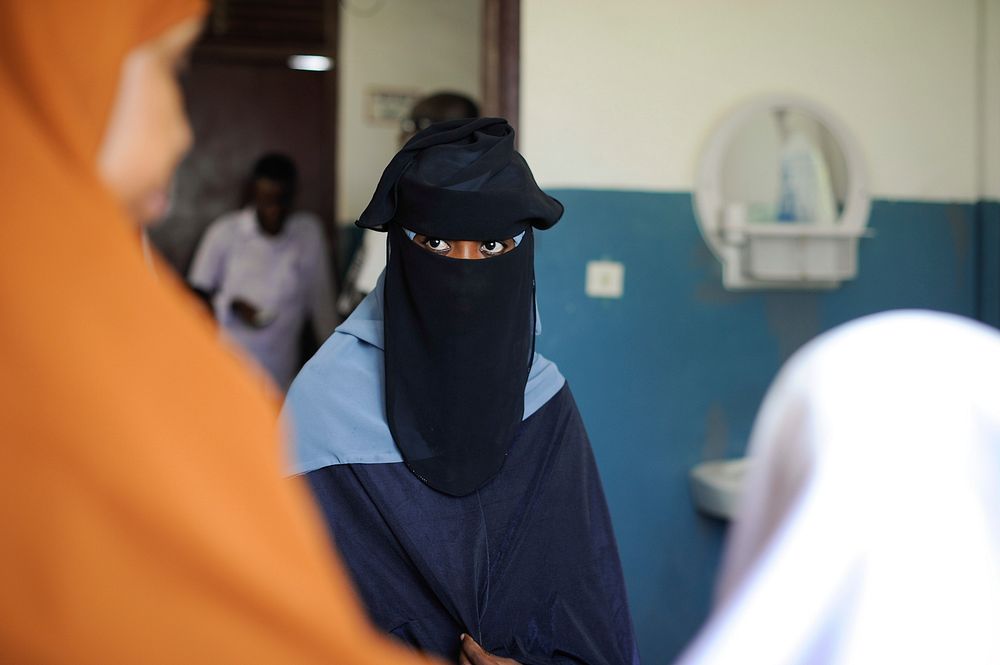A university student in Mogadishu, Somalia, talks to Dr. Lul Mahamud Mohamed before having an HIV test at Banadir hospital…