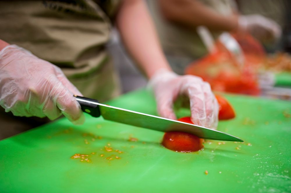 US army preparing food in kitchen. Original public domain image from Flickr