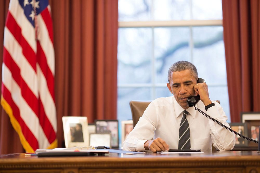 President Barack Obama talks on the phone in the Oval Office with Major General Joe Osterman, Commander of Marine Special…