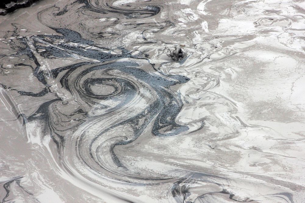 Swirling mud, natural disaster background. Original public domain image from Flickr