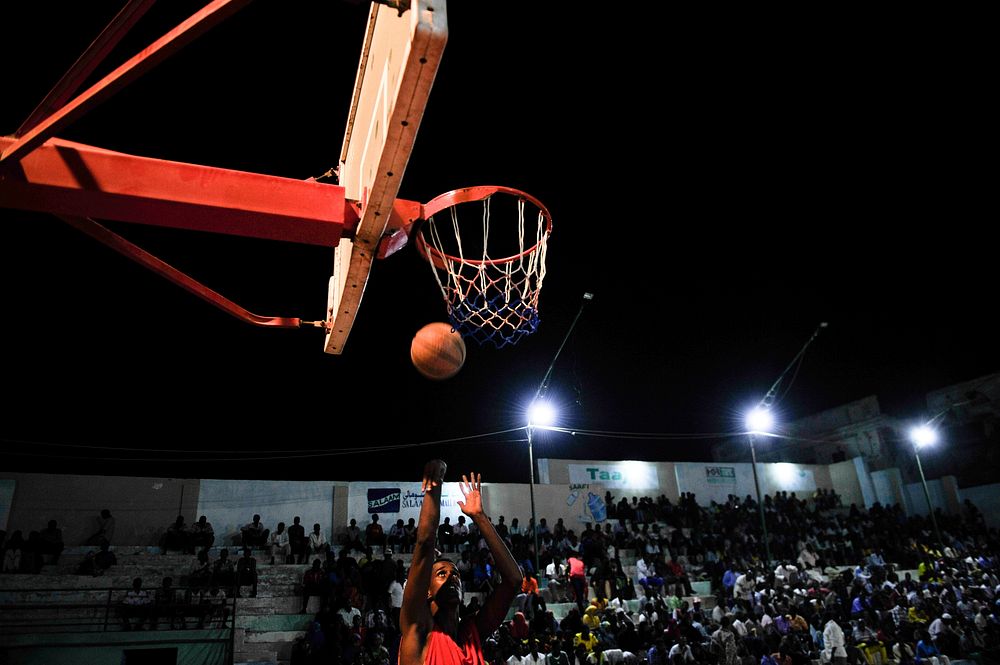 A Heegan basketball player tries to score a basket during their game against Horseed in Abdiaziz district of Mogadishu…