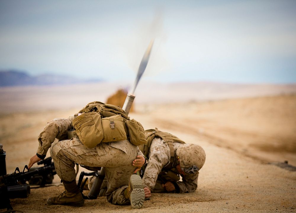 U.S. Marines assigned to mortar section, Fox Company, 2nd Battalion, 3rd Marine Regiment (2/3), fire the M224 60 mm mortar…