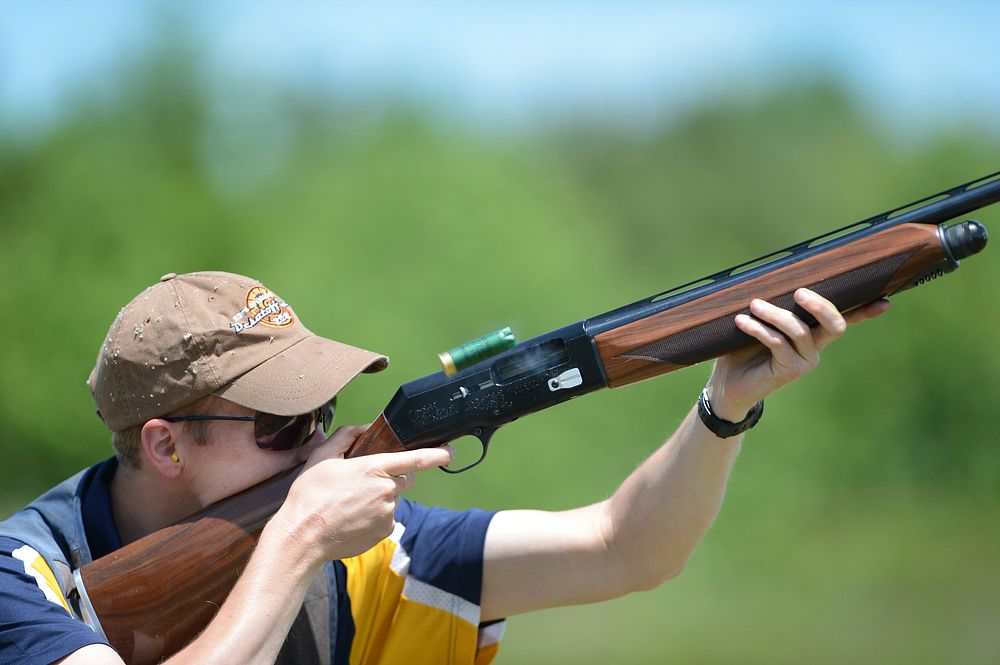 Navy Lt. Conner Stephens, a member of the Navy Skeet Team, shoots during the 2015 Armed Services Skeet Championships. The…