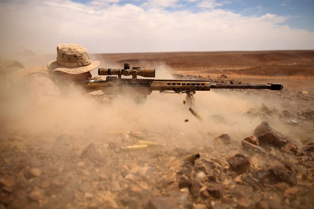 Corporal Drew Eyre, a scout sniper with Weapons Company, Battalion Landing Team 3rd Battalion, 6th Marine Regiment, 24th…