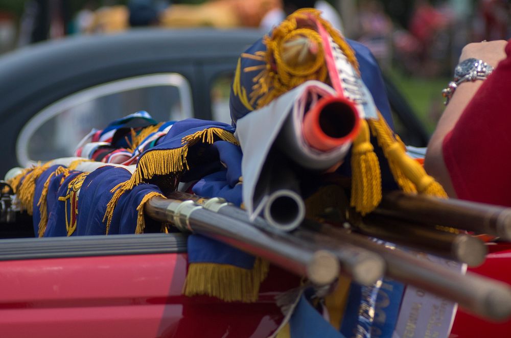 Flags lay rolled up on the back of a car after the 4th of July Parade in Villa Park. The parade was hosted by the Villa Park…