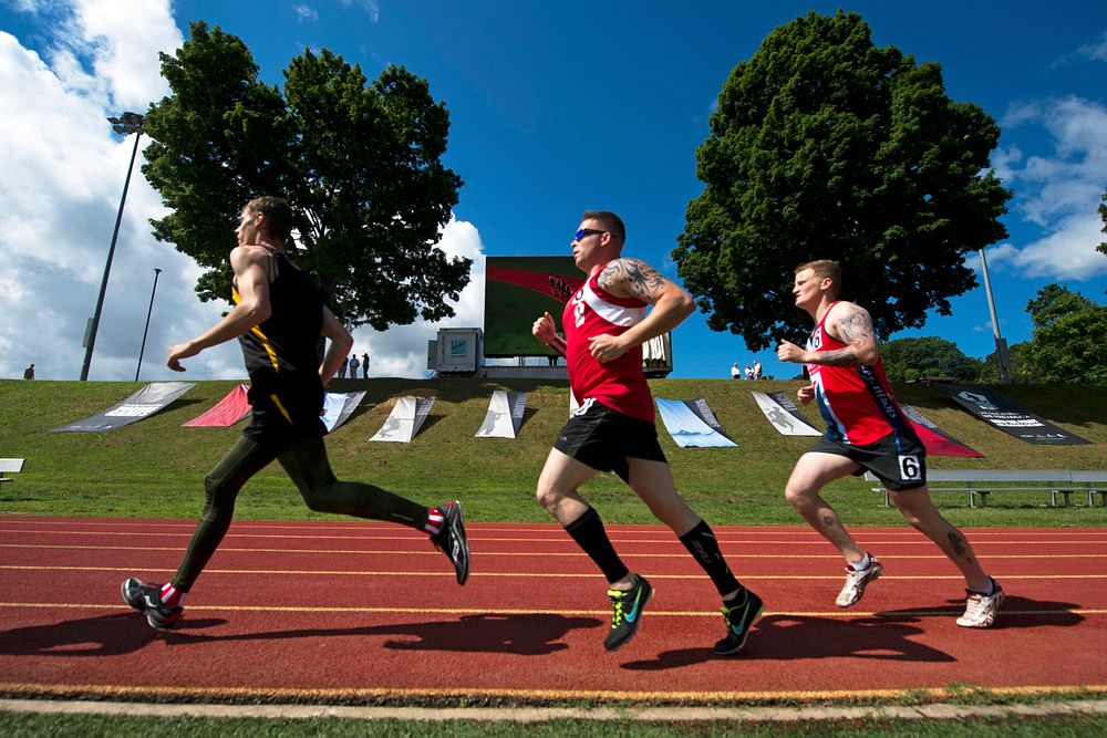 Runners compete in the 1500 meter dash during the 2015 Department of Defense Warrior Games at Marine Corps Base Quantico…