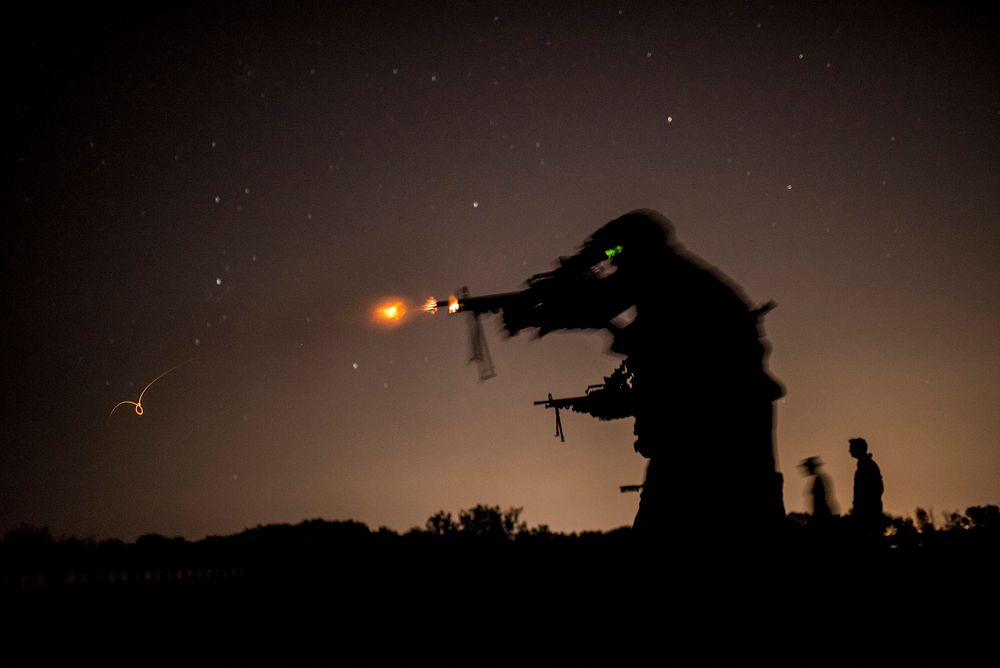 Light machine gun night fire. Original public domain image from Flickr