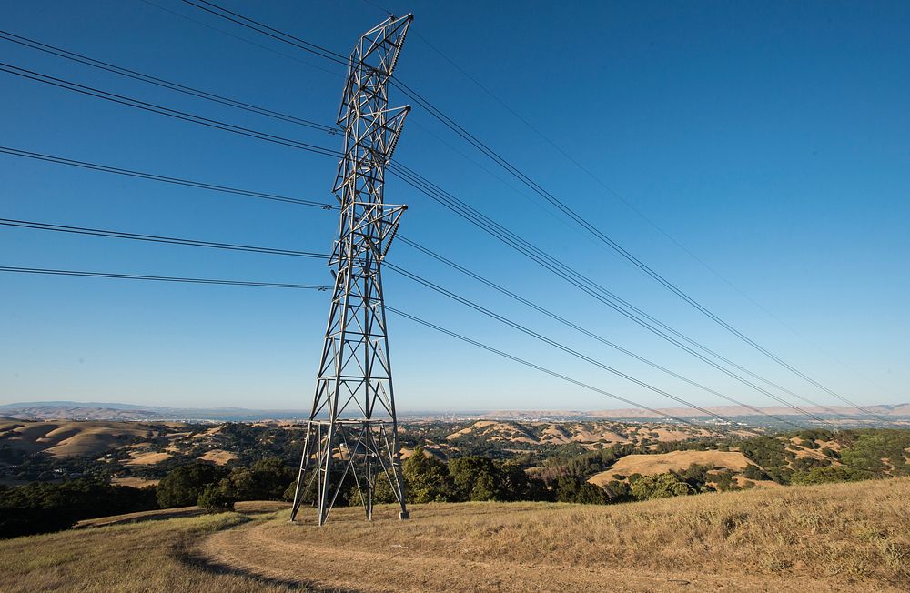 High voltage powerlines and towers. Original public domain image from Flickr