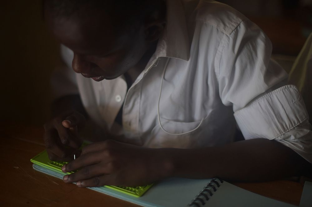 A blind child writes using braille at the Al-Nor School for the Blind in Mogadishu, Somalia, on October 31. The school…