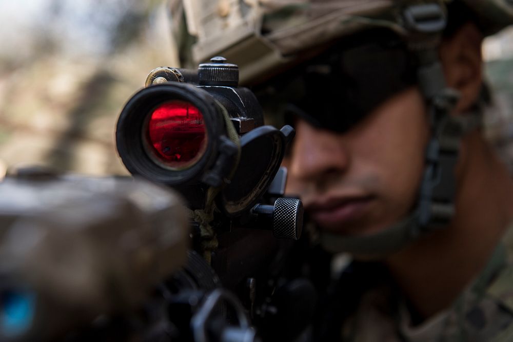 A U.S. Airman assigned to the 824th Base Defense Squadron guards an entrance to a building during close-quarters battle…