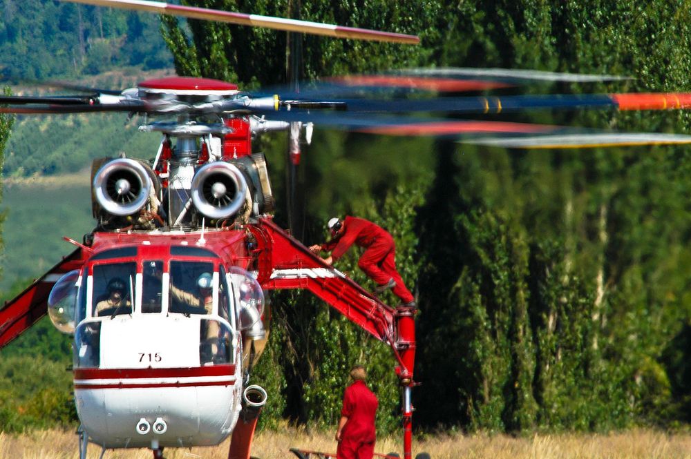 red Chinook helicopter having service | Free Photo - rawpixel