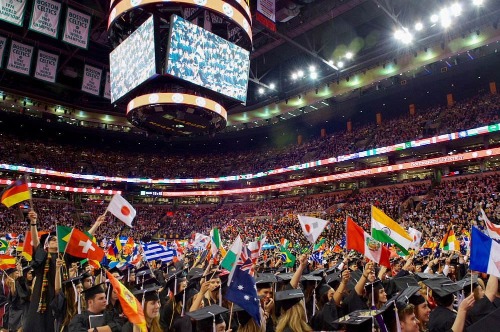 Students Wave Their National Flags Before Secretary Delivering the Commencement Address for Northeastern University's Class…