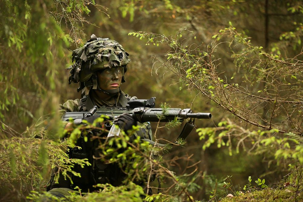 UTO, Sweden (June 11, 2016) A Swedish Marine from 1st Marine Regiment performs reconnaissance during the tactical exercise…
