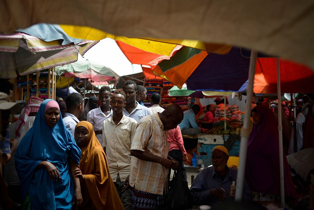 People walk through Hamarweyne market in Mogadishu, Somalia, as people prepare for Eid el-Fitr in the capital on July 4…