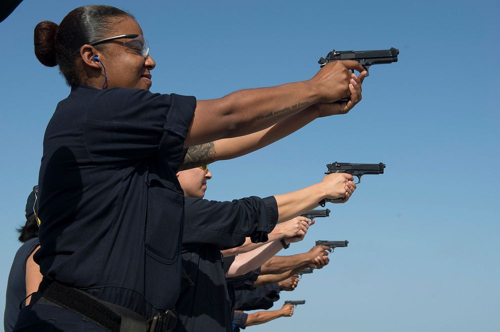 MEDITERRANEAN SEA (June 21, 2016) Sailors shoot M9 pistols aboard USS Porter (DDG 78) during small arms qualifications June…