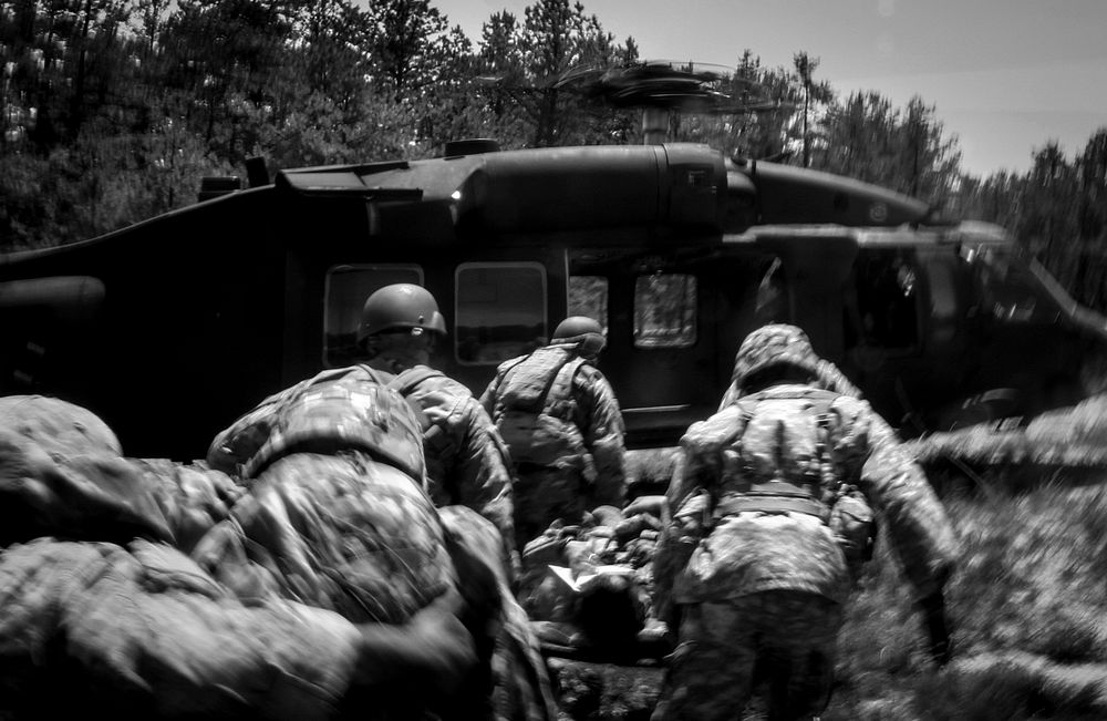 MEDEVACU.S. Army Reserve Soldiers from the 404th Civil Affairs Battalion transport simulated casualties to a New Jersey Army…