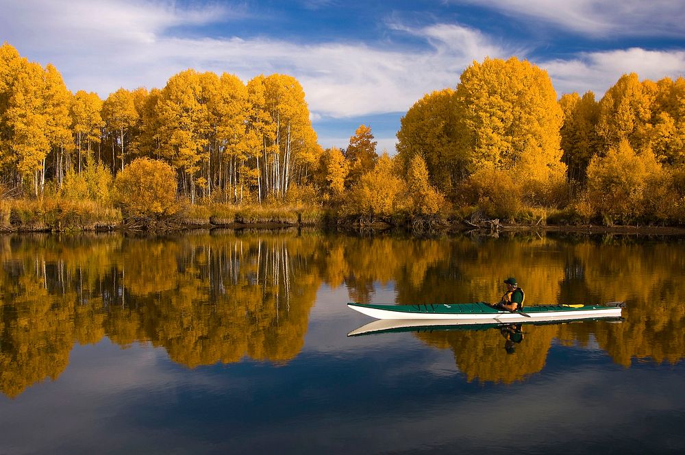 Kayaking Deschutes River by Dillon Falls on the Deschutes National Forest in Oregon. Original public domain image from Flickr
