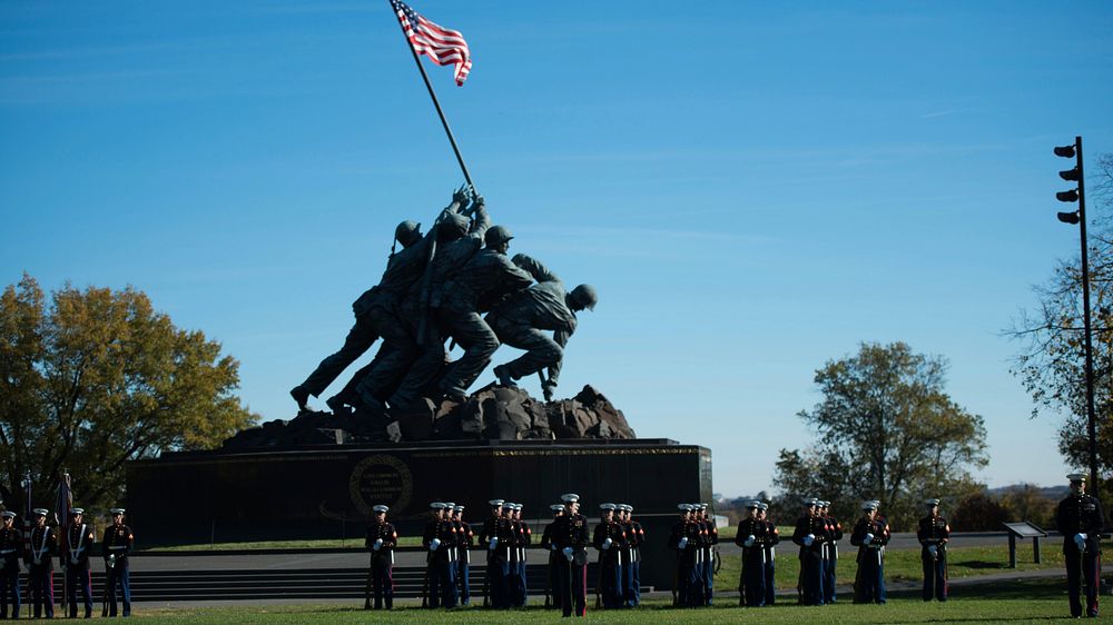 Marines from Marines Barracks Washington form up during a reunion at the Marine Corps War Memorial in Arlington, Va., Nov.…