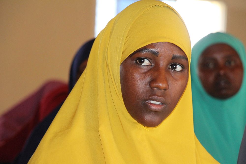 Youth participate in an event organized by the African Union Mission in Somalia (AMISOM) to sensitize them on political…