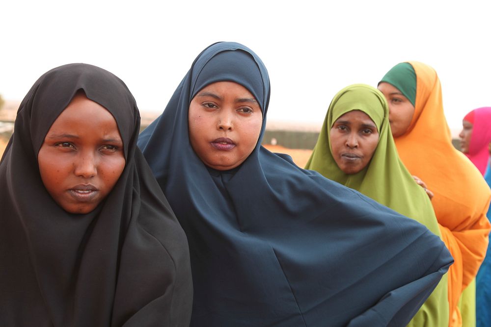 New recruits for the Interim Jubbaland Administration (IJA) line up for a security check at Kismayo Police Training School…