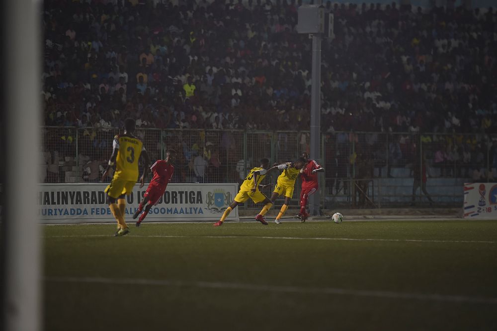 Players fight over the ball in the finals of the Mogadishu District Football Tournament between the Waaberi and Shibis…