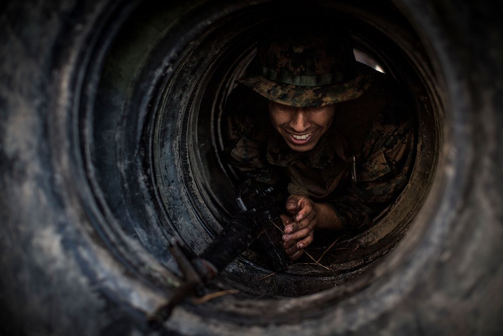 U.S. Marine Corps Cpl. Manuel Serrano, a combat videographer with the Combat Camera section, Marine Corps Combat Service…
