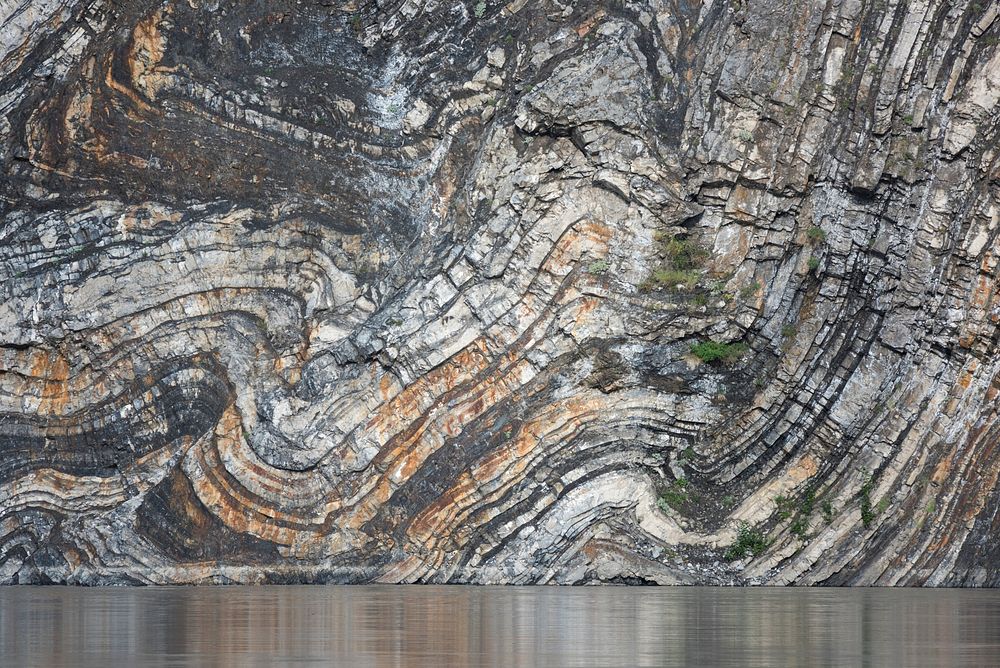 A detail of the rocks of Calico bluff in Yukon-Charley Rivers National Preserve.NPS Photo / Sean Tevebaugh 2016. Original…