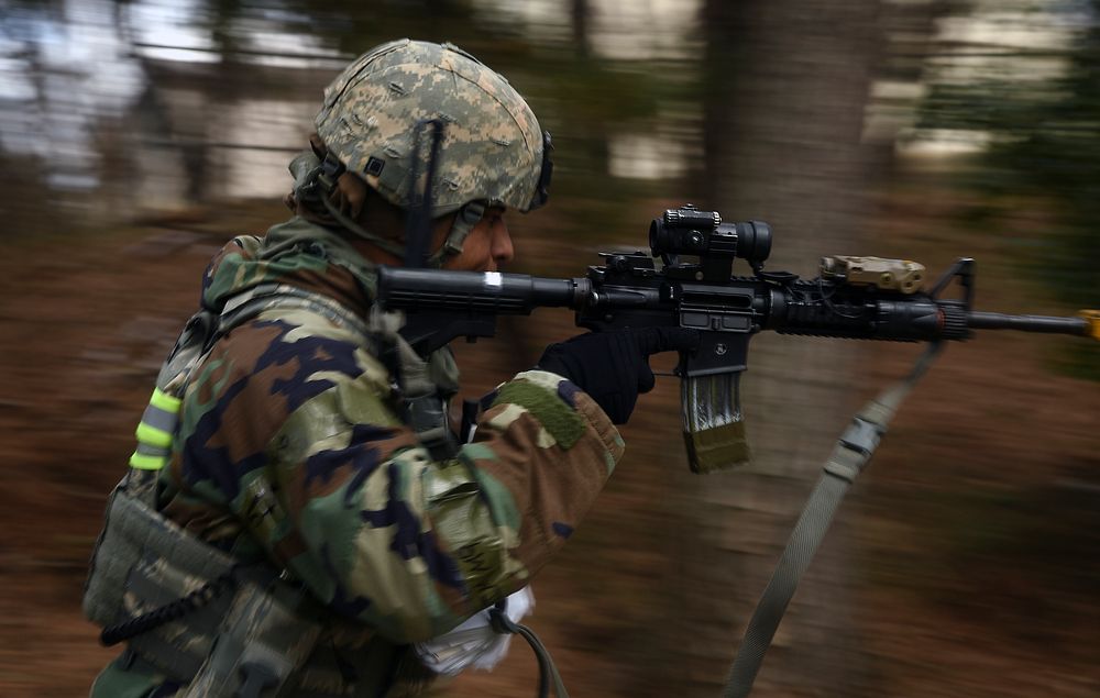 Tech. Sgt. Jeffery Self, 8th Security Forces Squadron team member, advances toward opposing forces during a training…