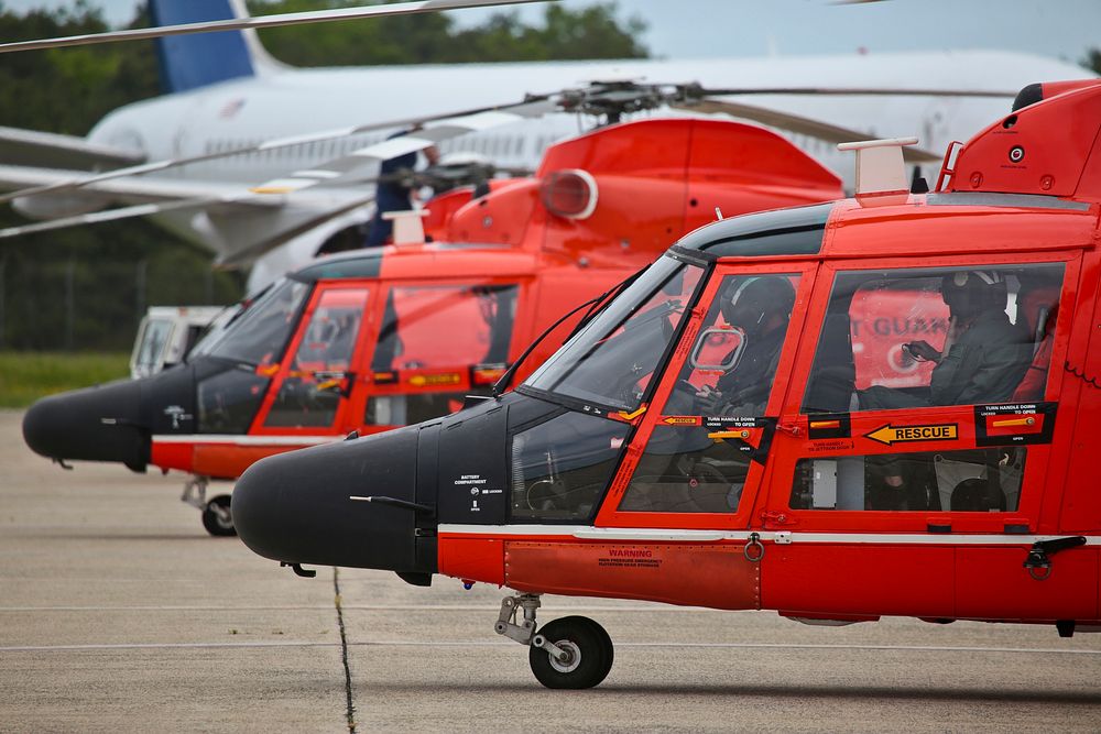 U.S. Coast Guard HH-65C Dolphin helicopters from Coast Guard Air Station Atlantic City are prepared for a mission during a…