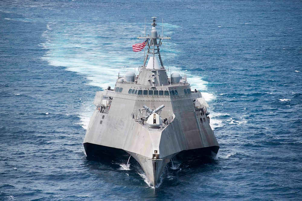 The littoral combat ship USS Coronado (LCS 4) steams ahead during a division tactics exercise in support of Cooperation…