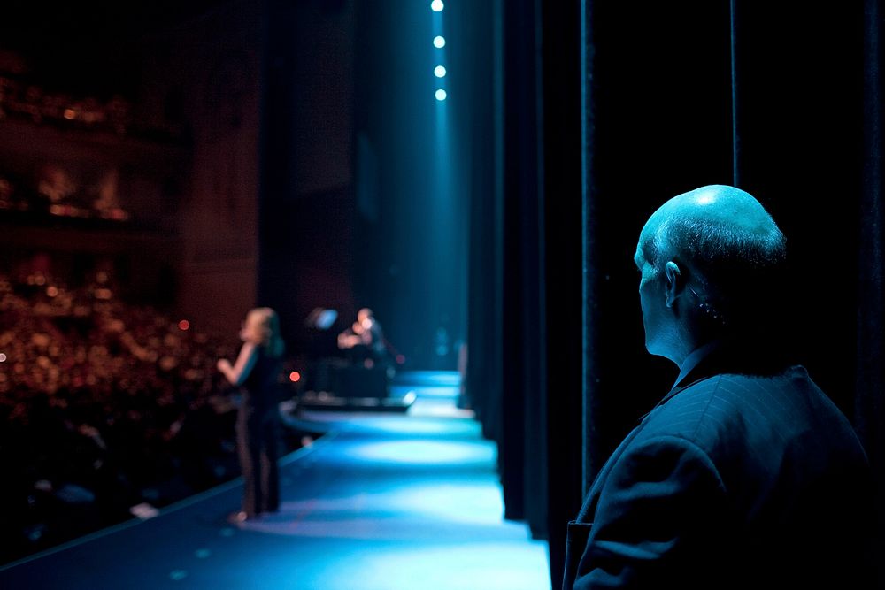 A Secret Service agent offstage watches as President Barack Obama speaks during a Las Vegas fundraiser for Sen. Harry Reid…