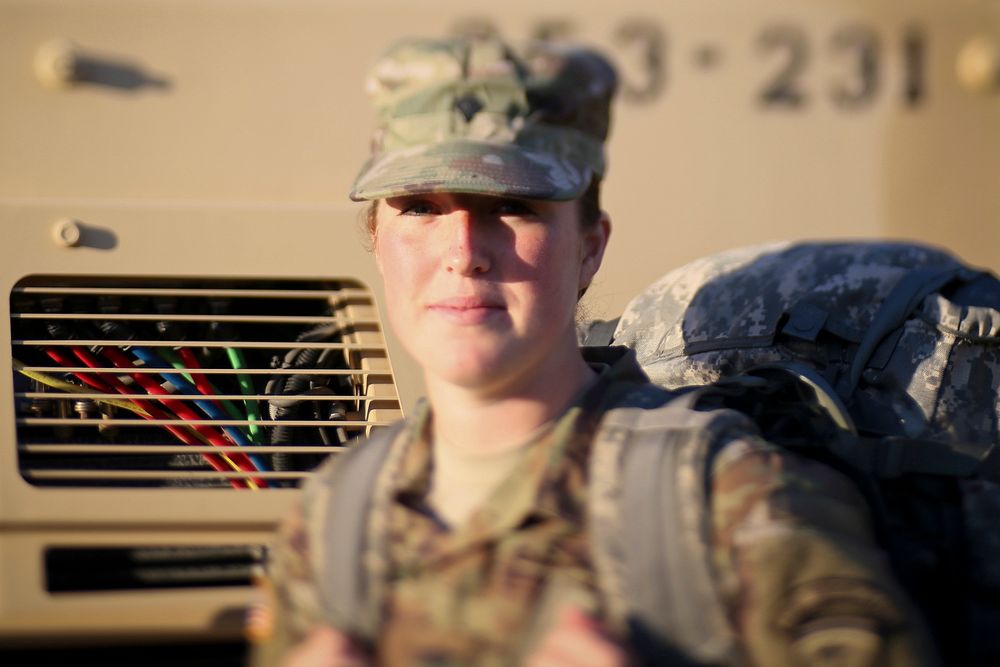 New Jersey Army National Guard Spc. Ellen Pfeifle from the 253rd Transportation Company stands for a portrait before…