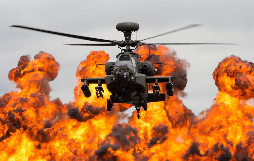 A Royal Air Force WAH-64D Apache helicopter demonstrates its combat capabilities for spectators during the 2017 Royal…