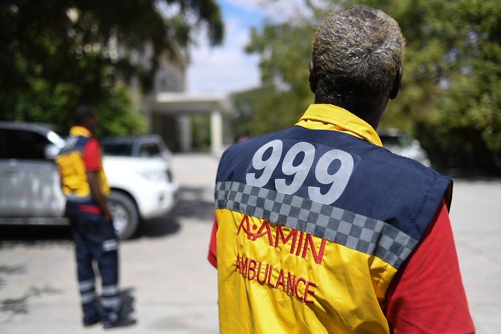 A driver of Aamin Ambulance stands in front of Benadir Hospital in Mogadishu, Somalia on 28 October 2017.