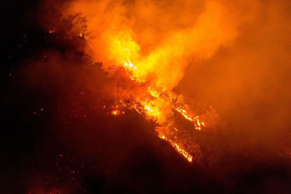 The Thomas Fire, named for the fire's point of origin near St. Thomas Aquinas College in Santa Paula, California, burns on a…