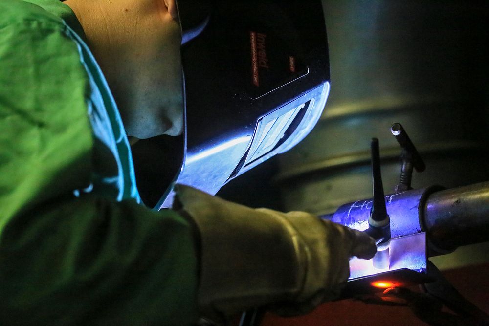 Rhode Island Army National Guard Sgt. Anthony Iapicca performs gas tungston arc welding on stainless steel during the Allied…