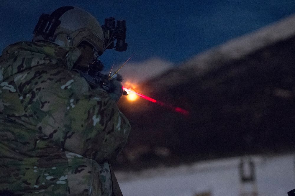 An Airman assigned to the 3rd Air Support Operations Squadron, fires an M4 carbine during night live-fire sustainment…