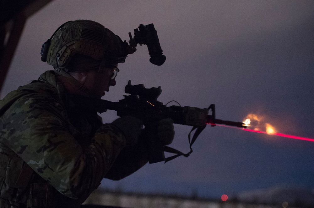 An Airman assigned to the 3rd Air Support Operations Squadron, fires an M4 carbine during night live-fire sustainment…