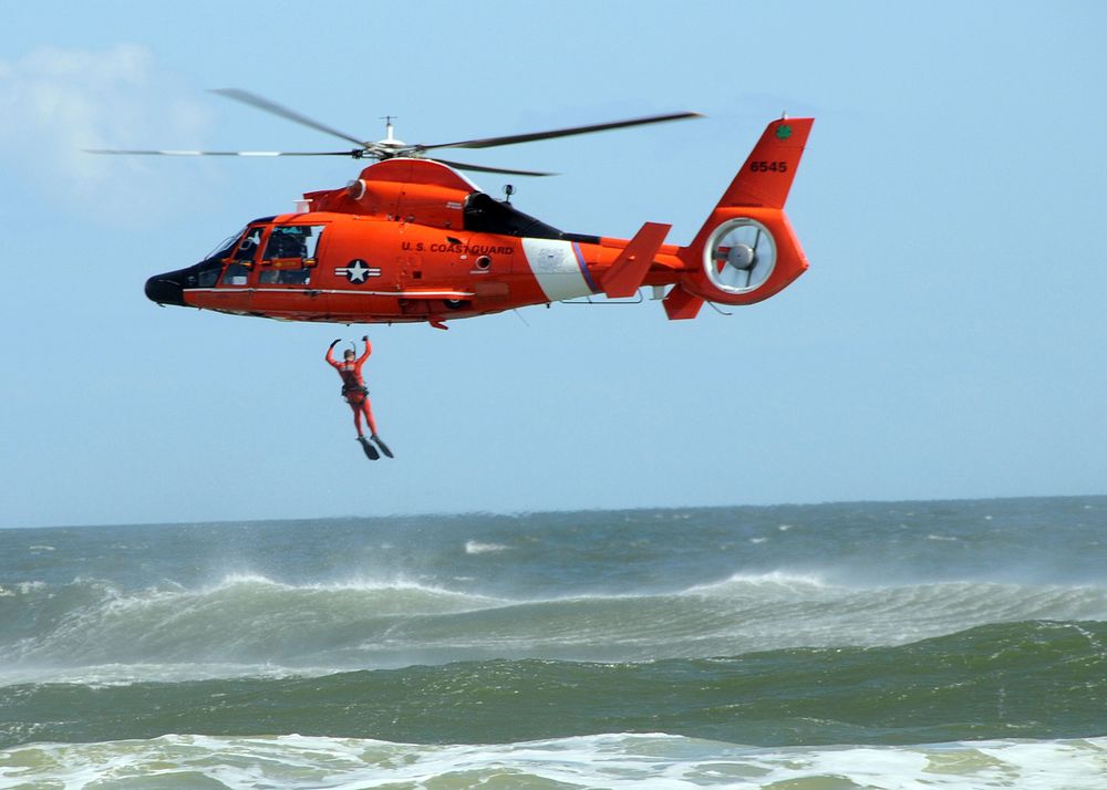 U.S. Coast Guardsmen demonstrate a search and rescue mission during the Sea and Sky Spectacular 2009 in Jacksonville, Fla.…