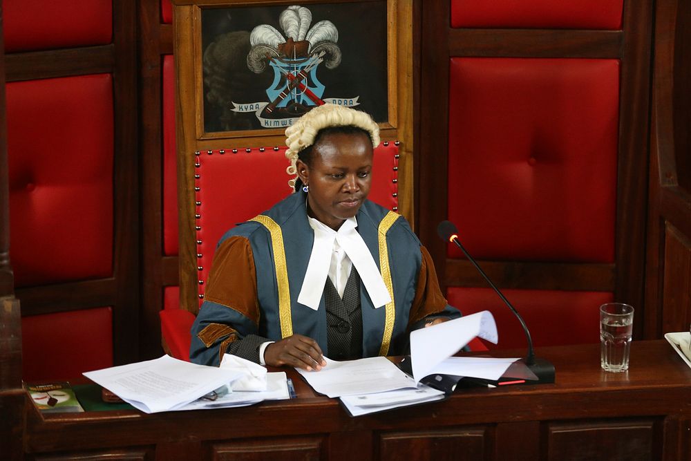 Florence Mwangangi, the Speaker of Machakos County Assembly, reads proceedings during a visit by the Hirshebelle Regional…