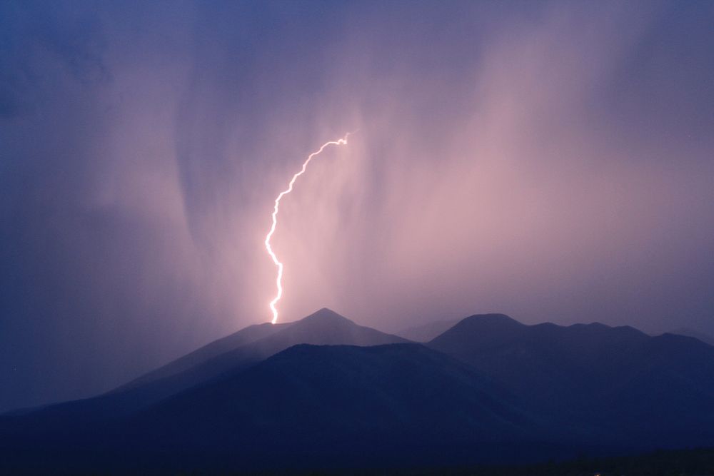 A thunderstorm during monsoon season provides vital, life-sustaining water to Coconino National Forest, Arizona, July 4…