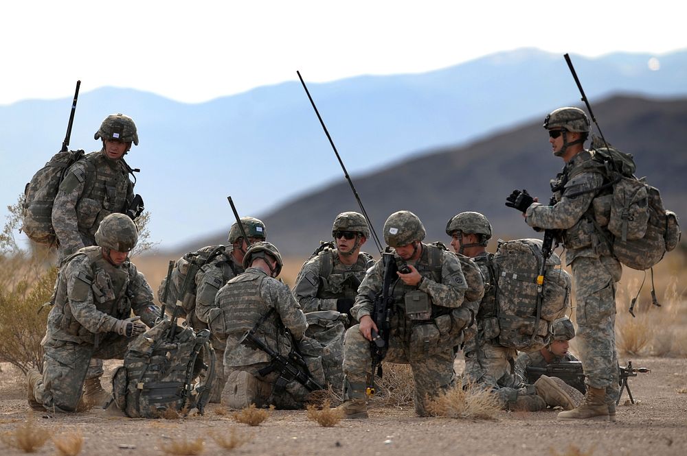 U.S. Soldiers from 173rd Cavalry Airborne Reconnaissance Squadron out of Fort Bragg, N.C., meet at a rally point after being…