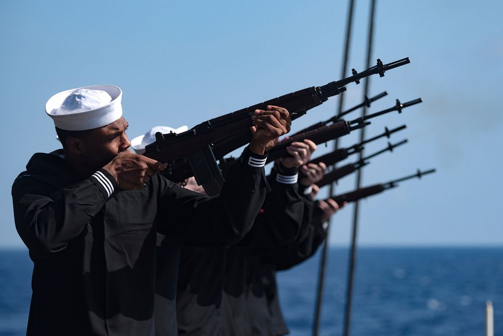 MEDITERRANEAN SEA (May 11, 2018) Gunner's Mate Seaman Apprentice Noah Ogun, front, participates in a firing squad during a…