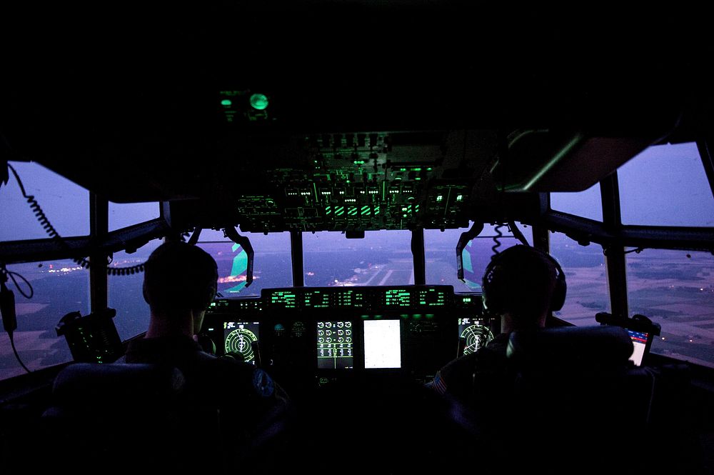 U.S. Air Force Capt. Leland Quinter, left, and Capt. Pete Wolber, both 37th Airlift Squadron C-130J Super Hercules pilots…