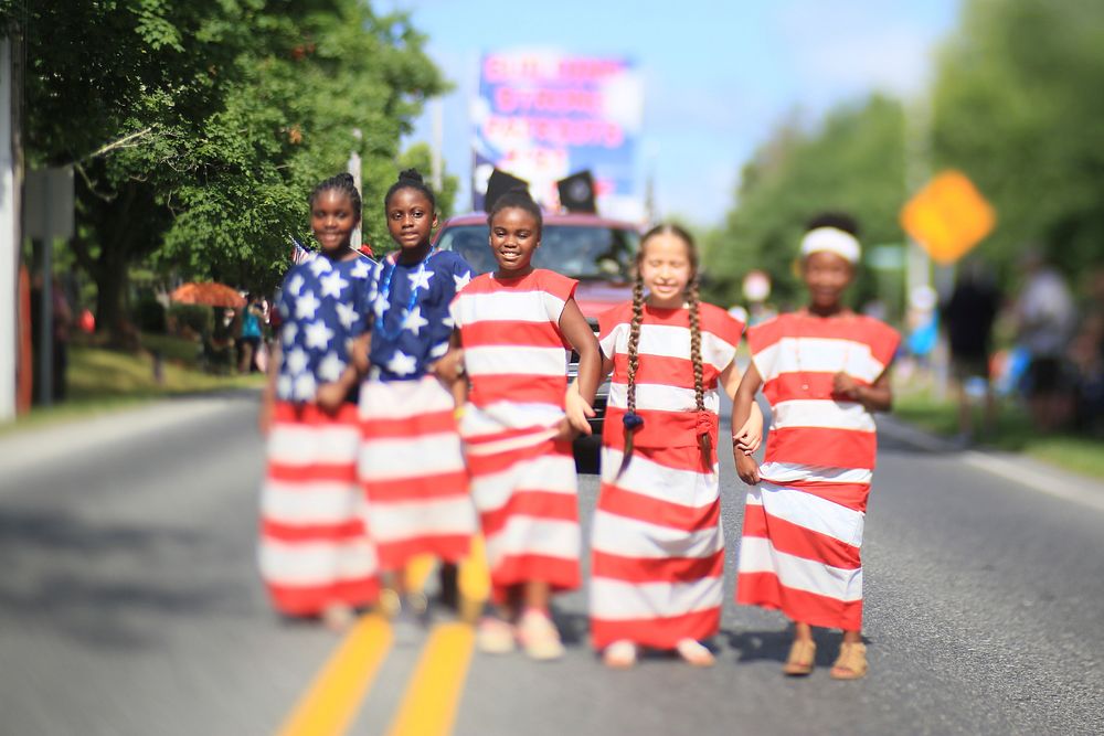 Girls celebrating in U.S.A. flag Original public domain image from Flickr