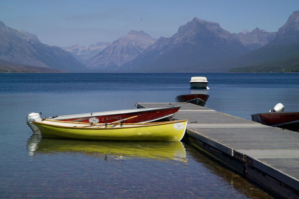 Boats tied up on Lake McDonald. Original public domain image from Flickr